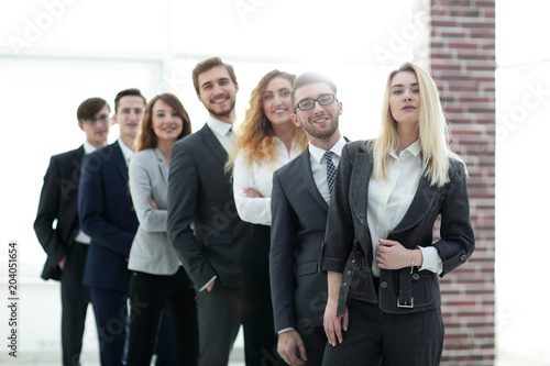 group of young business people standing in a row.