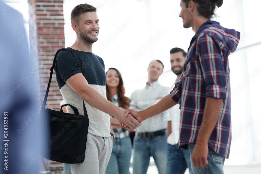 Fototapeta premium uścisk dłoni pracowników Agencji
