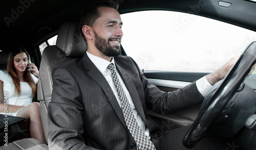 Portrait of a man driving a car © ASDF
