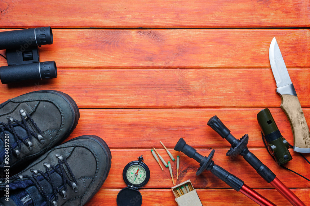 Flat lay image of plan travel.Background concept.Items for traveler and backpacker adult or teenage to holidays trip.Items for hiking and travel to mountains.Space for creative design. Flat lay image of plan travel.Background concept.Items for traveler and backpacker adult or teenage to holidays trip.Items for hiking and travel to mountains.Space for creative design.