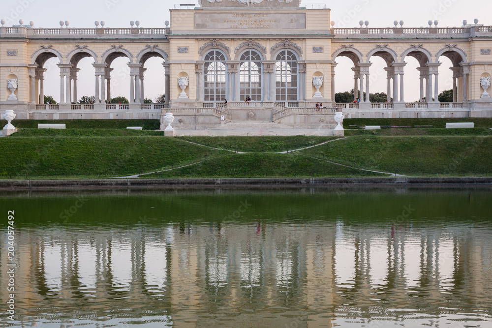 Fototapeta premium The building near the lake in Schoenbrunn gardens