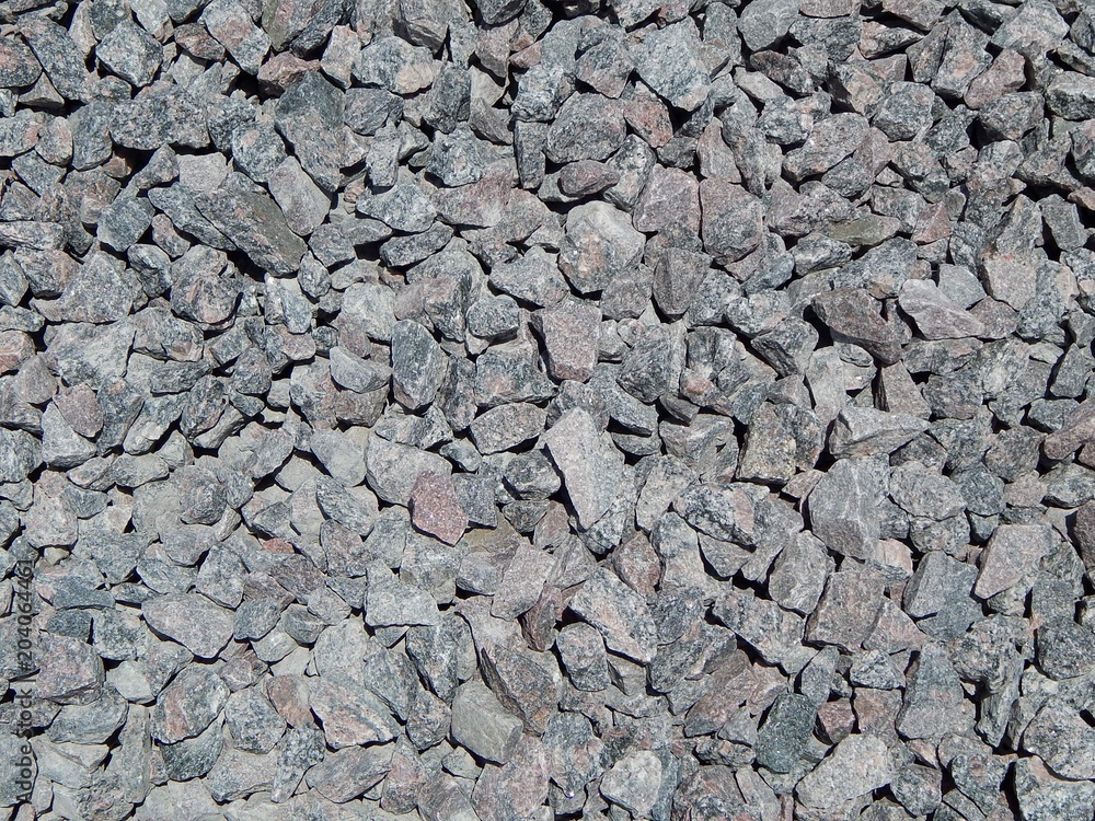 Crushed stone. The background and the texture of gravel, stone. Crushed stone. The background and the texture of gravel, stone.