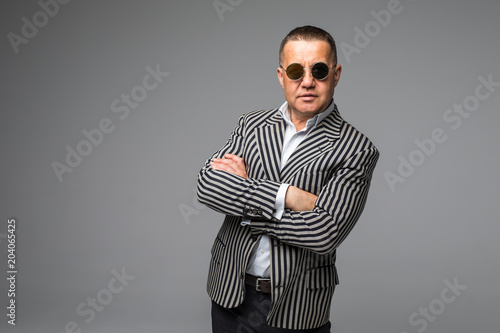 Cuadro en lienzo Casual moddle age man in suit Isolated over white