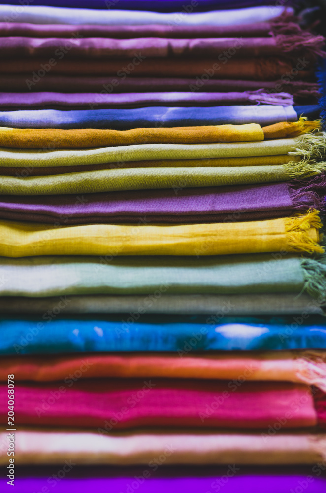 Retro look of a pile of colorful silky scarfs Retro look of a pile of colorful silky scarfs