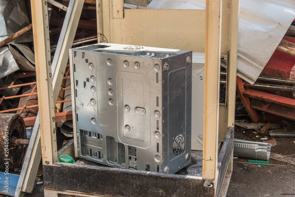 Old computer cases at the dump - the concept of technology change Old computer cases at the dump - the concept of technology change