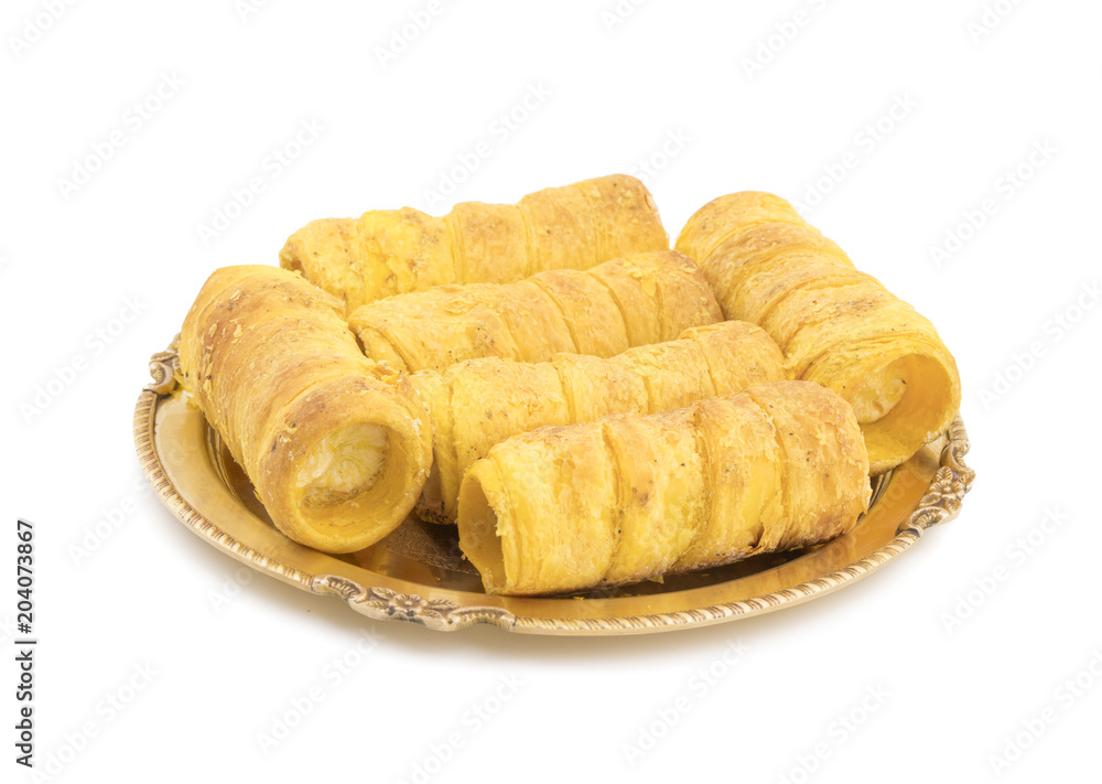 Sweet Dish Puff Roll with Cream Also Know As Homemade Cream Roll, Bakery Food Isolated on White Background Sweet Dish Puff Roll with Cream Also Know As Homemade Cream Roll, Bakery Food Isolated on White Background