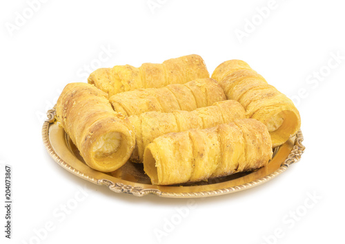 Sweet Dish Puff Roll with Cream Also Know As Homemade Cream Roll, Bakery Food Isolated on White Background