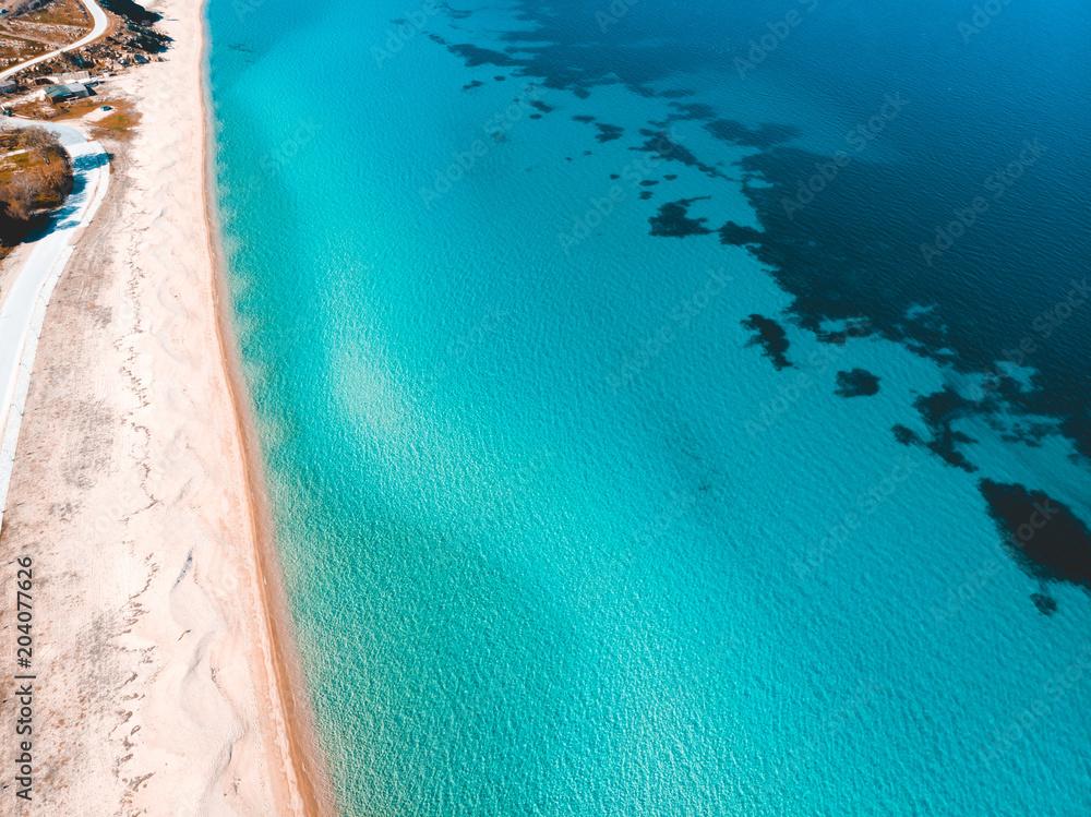 Aerial view of azure sea with beach