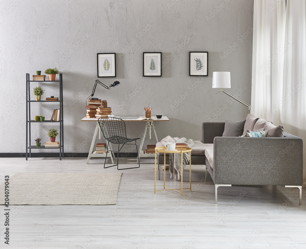 Obraz premium modern home office grey details with furniture and working object. frame lamp and bookcase.