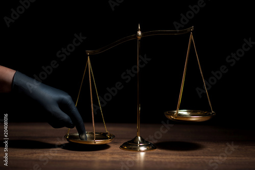 Hand with black glove
