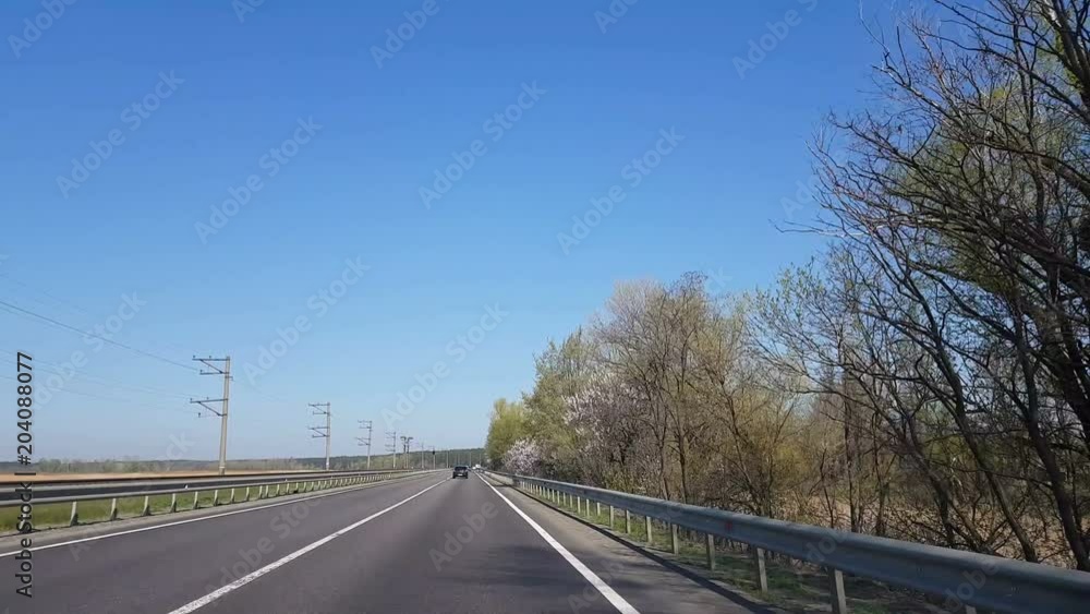 Driving a Car on a Country Road - Point of view front - windshield. Day. Dynamic scene, 4k video Driving a Car on a Country Road - Point of view front - windshield. Day. Dynamic scene, 4k video