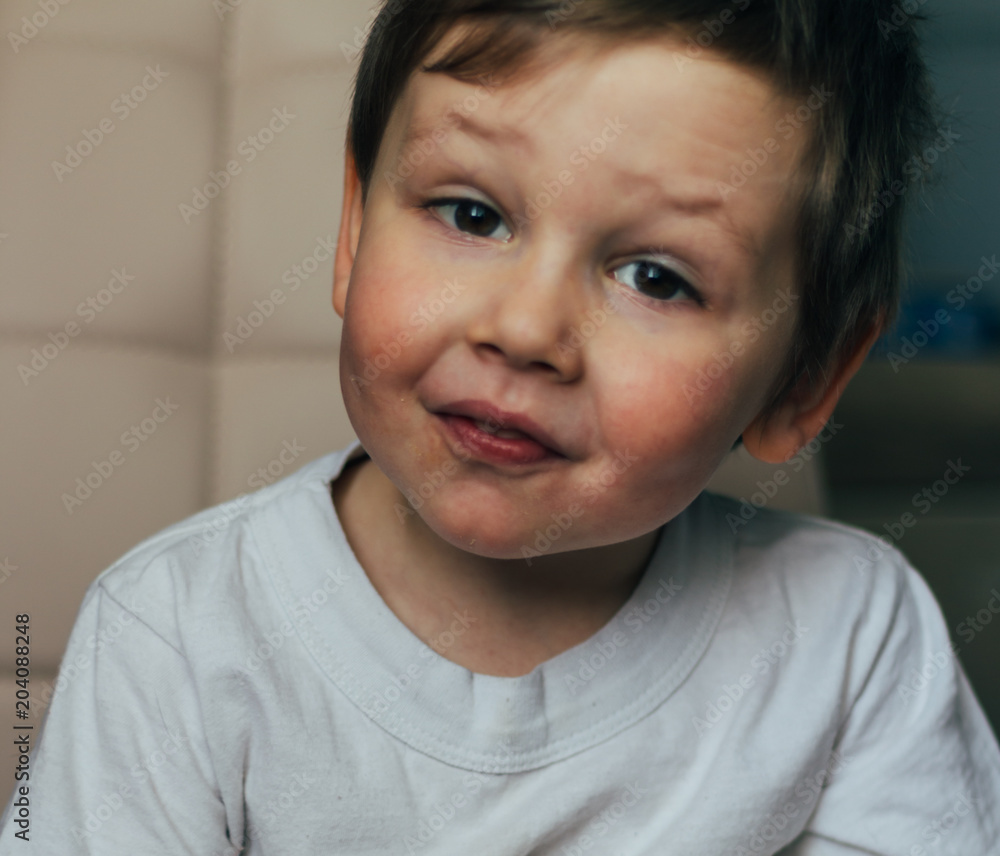 a small boy is sitting on a chair with a broken arm, in a cast. hospital. medicine. danger. pain. to break limbs. violence. a small boy is sitting on a chair with a broken arm, in a cast. hospital. medicine. danger. pain. to break limbs. violence.