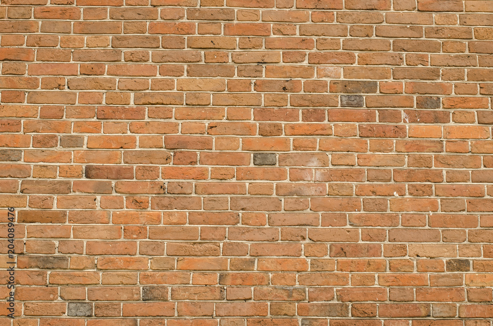 a brick wall made of old stone a brick wall made of old stone