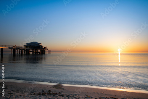 Baltic Sea, Lübeck Bay at Timmendorfer Beach with pier in early morning,