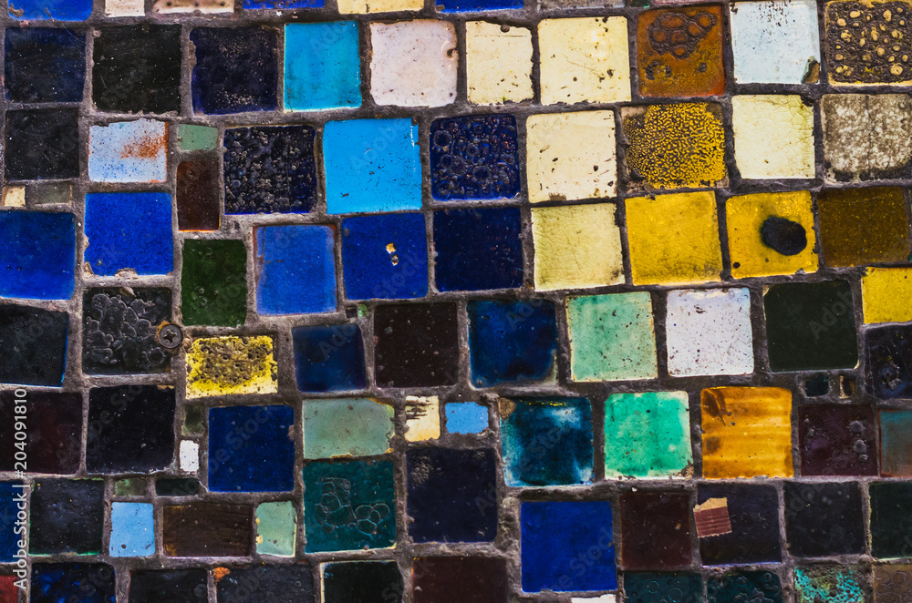 Urban mosaic background with colorful handmade tiles Urban mosaic background with colorful handmade tiles