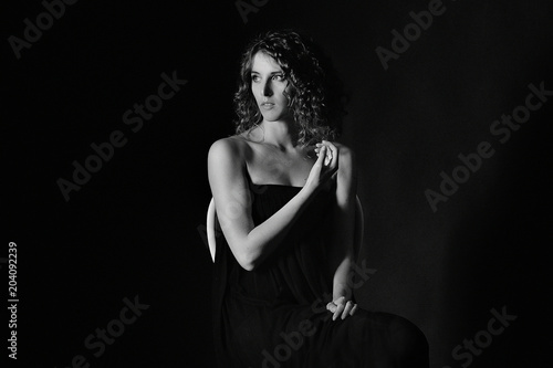 female portrait in a dark hall,