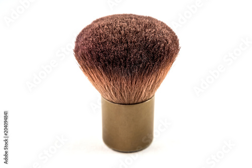 Small foundation make up brush isolated on white background photo