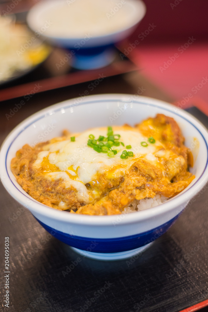 Japanese cheese deep fried pork cutlet (tonkatsu) in japanese restaurant