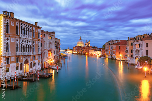 Grand canal and The Basilica of St Mary of Health or Basilica di Santa Maria della Salute at night in Venice  Italy
