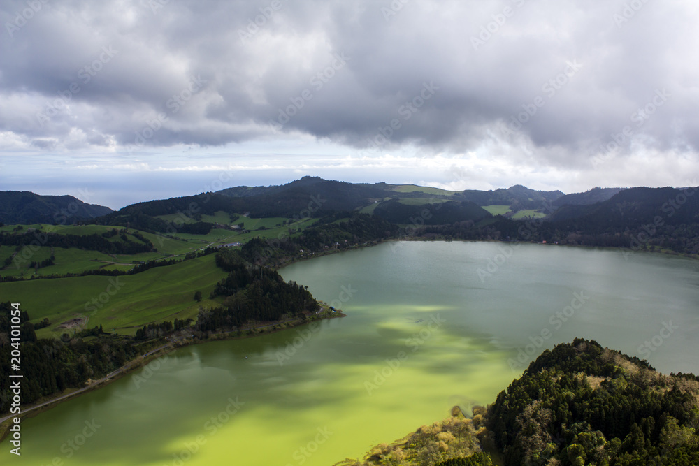 Beautiful Lagoon with forest surrounding . Furnas Lagoon landscape