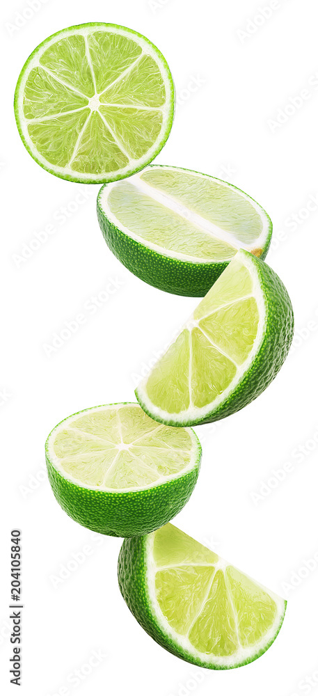 Slices lime flying in the air