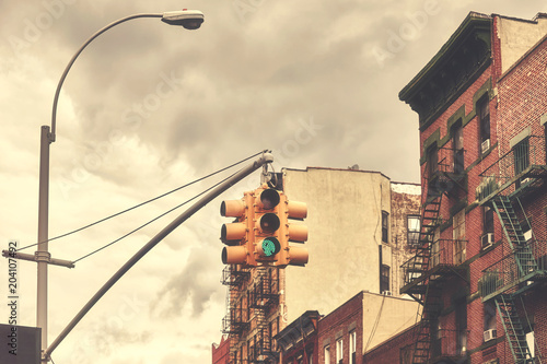 Canvas Print Retro toned picture of New York City traffic lights, selective focus, USA