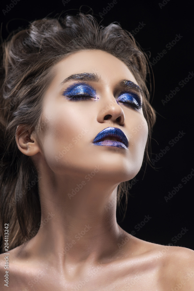 Portrait of a beautiful big breast asian naked shoulders, vanguard conceptual hairstyle and aggressive blue lips makeup girl Portrait of a beautiful big breast asian naked shoulders, vanguard conceptual hairstyle and aggressive blue lips makeup girl