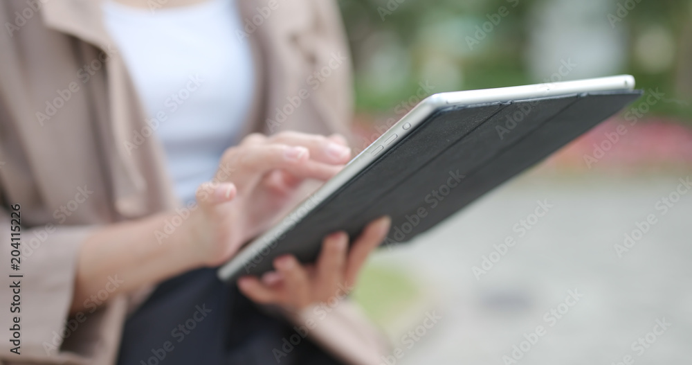 Woman using tablet computer Woman using tablet computer