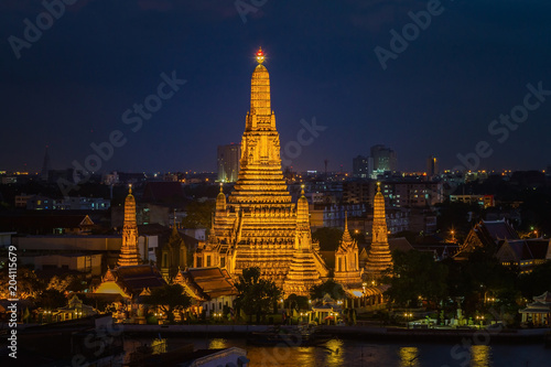 Wat Arun Temple at twilight in bangkok Thailand .