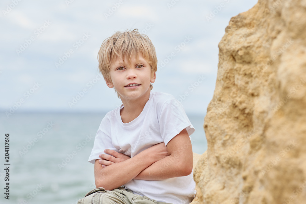 Portrait of happy young boy having fun at the seaside Portrait of happy young boy having fun at the seaside
