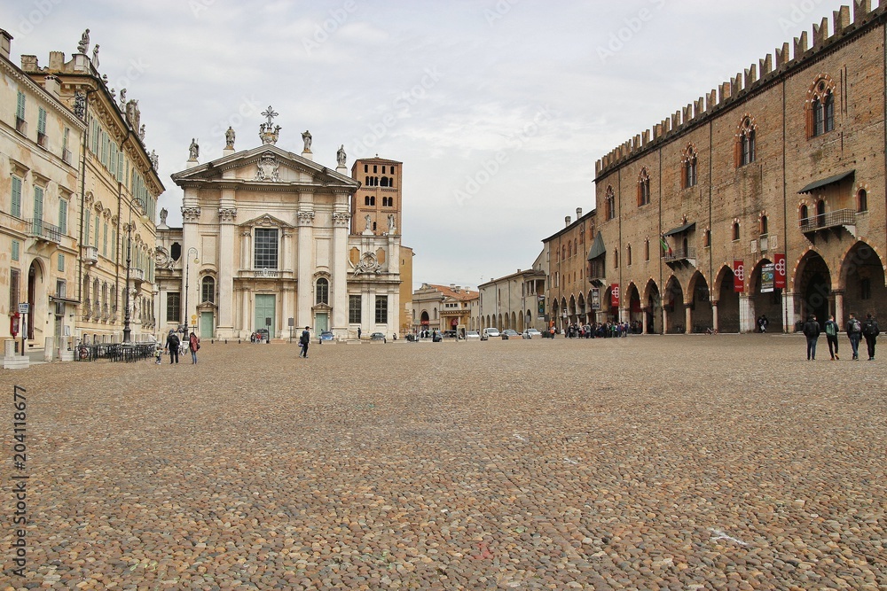 The famous Renaissance square Piazza Sordello in Mantua. View of the cathedral San Pietro and Palazzo Ducale. Northern Italy, South Europe.