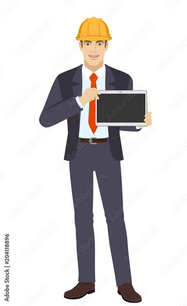 Businesswoman in construction helmet showing blank digital tablet PC Businesswoman in construction helmet showing blank digital tablet PC