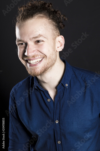 Young ginger man studio portrait