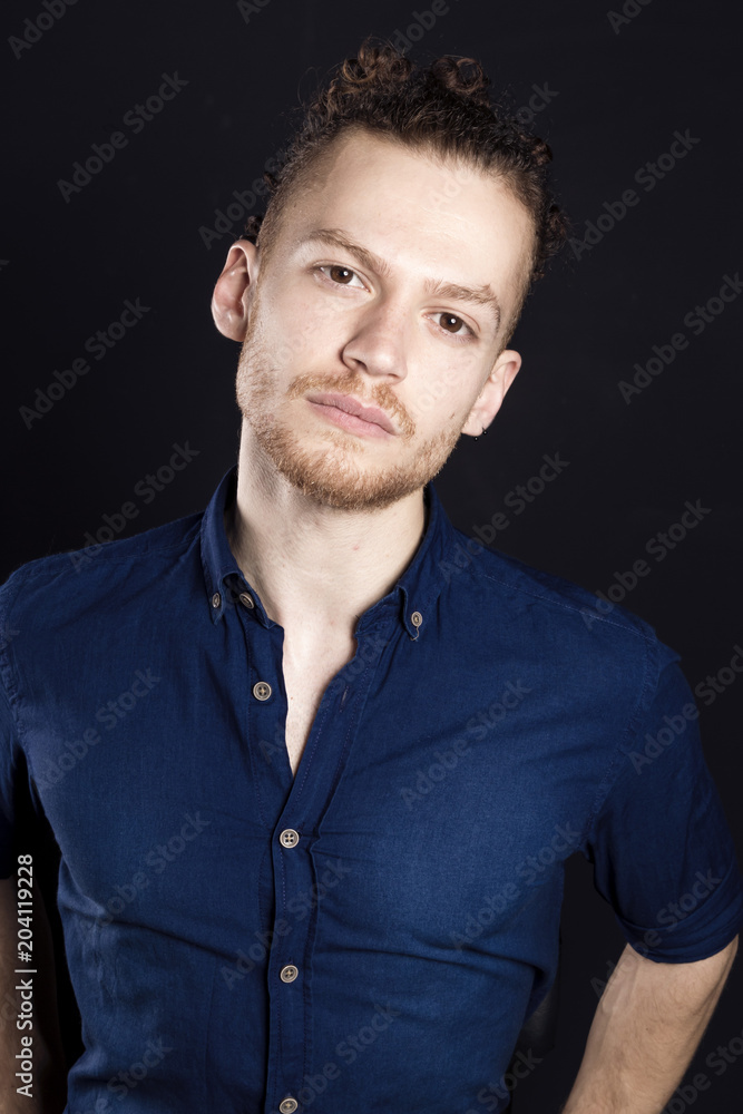 Obraz premium Young ginger man studio portrait