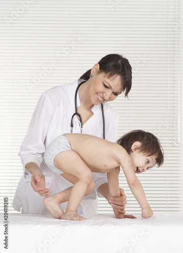 Female doctor with child