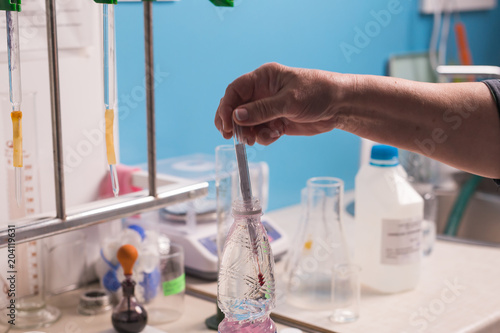 Lab assistant testing water quality