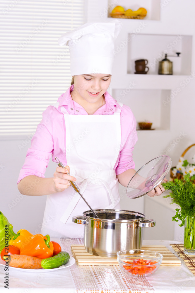 beautiful girl wearing chef uniform cooking beautiful girl wearing chef uniform cooking