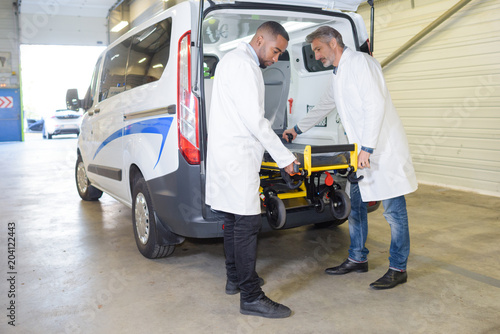 paramedics preparing the equipments photo