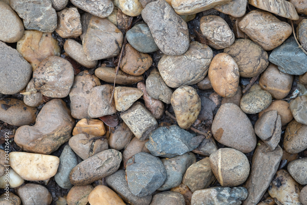 Close up of stone and pebble on ground with dry leaf for background or wallpaper. Close up of stone and pebble on ground with dry leaf for background or wallpaper.