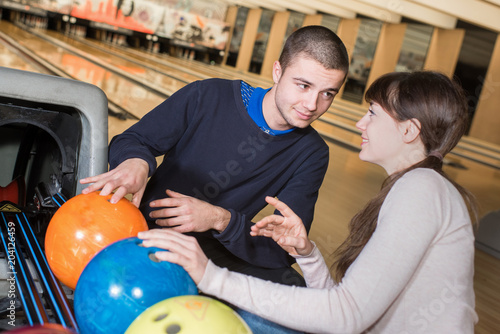 dating couple enjoy bowling together