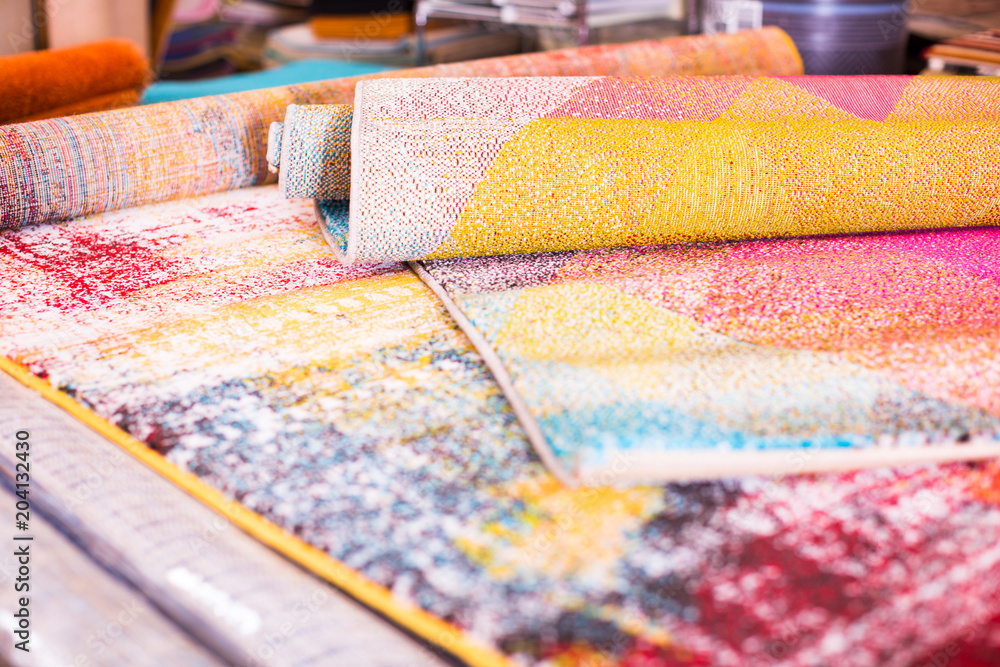 Fototapeta premium Image of traditional woolen carpets at carpet market