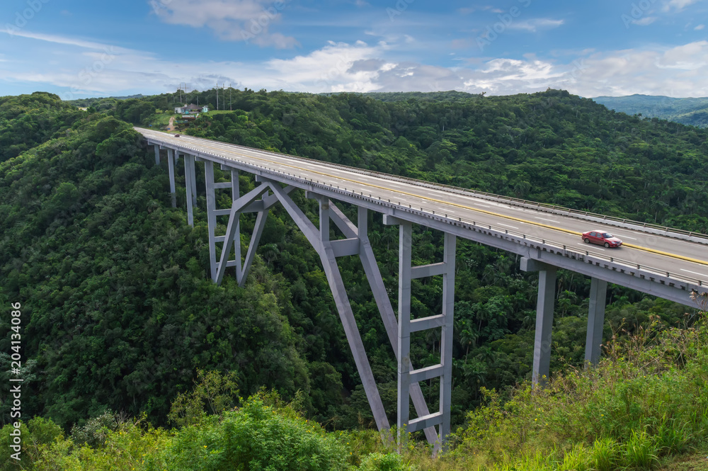 The Bakunagua Bridge is one of Cuba's attractions. The bridge's altitude is 110 meters, and its length is 103 meters. The Bakunagua Bridge is one of Cuba's attractions. The bridge's altitude is 110 meters, and its length is 103 meters.