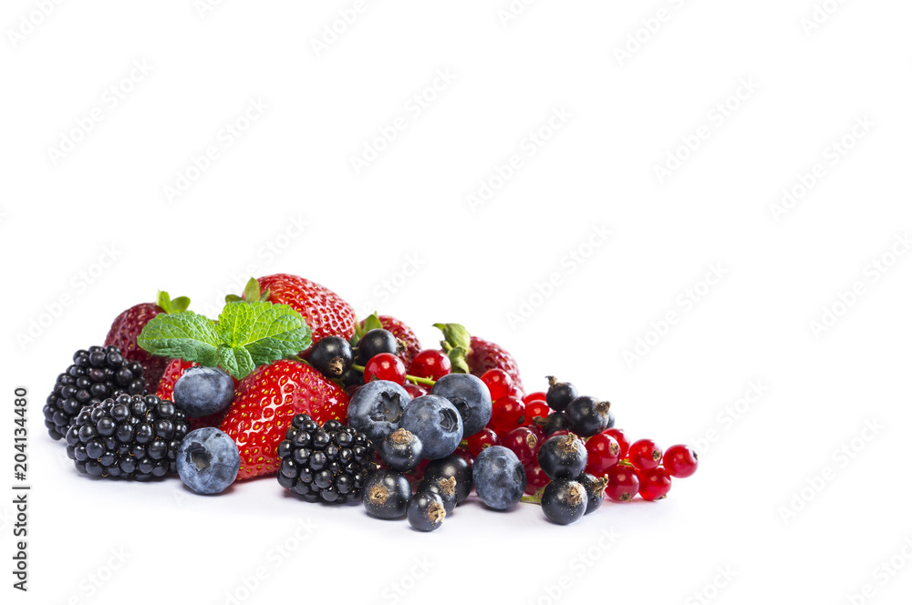 Ripe currants, blackberries, blueberries and strawberries with a mint leaf. Sweet and juicy fruits with copy space for text. Background of mix fruits on a white background. Top view. Ripe currants, blackberries, blueberries and strawberries with a mint leaf. Sweet and juicy fruits with copy space for text. Background of mix fruits on a white background. Top view.