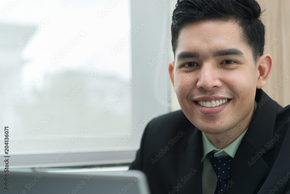 Asian businessman think about work at office,Thailand worker have an ideas for project for tomorrow Asian businessman think about work at office,Thailand worker have an ideas for project for tomorrow
