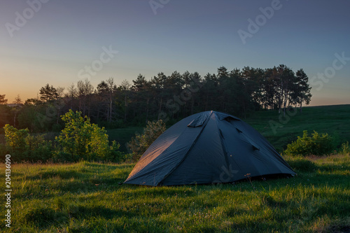 Tourist tent on the background of an old castle.