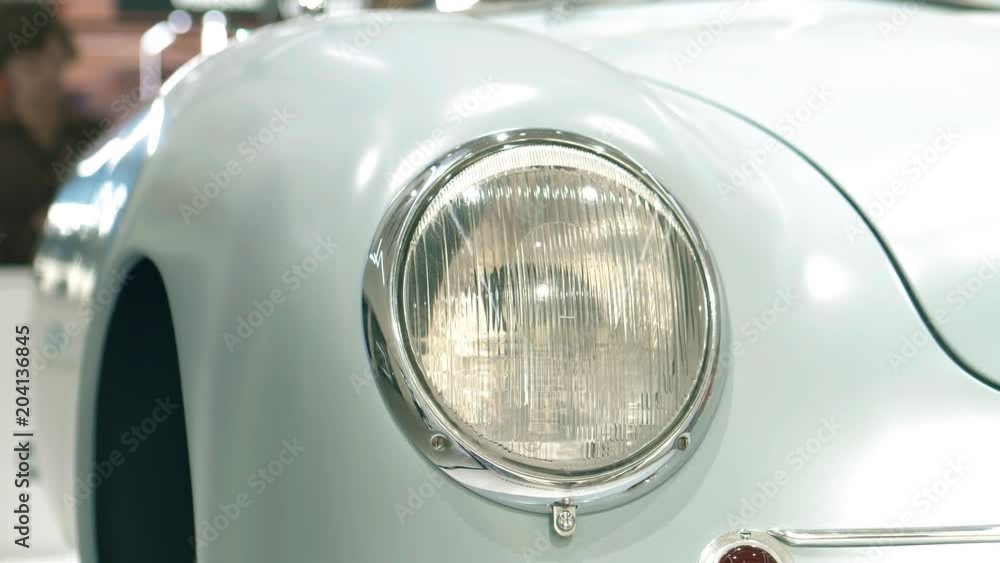 Headlight of a retro sports car Headlight of a retro sports car