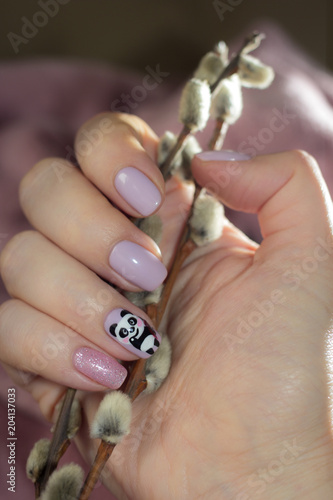 Manicure with a fluffy cute panda