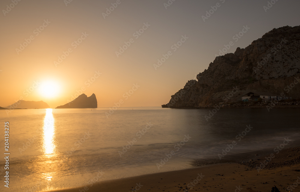 Sunrise on a beach in Aguilas, Murcia