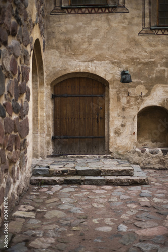 Fototapeta Naklejka Na Ścianę i Meble -  Windows, doors and walls of the castle 