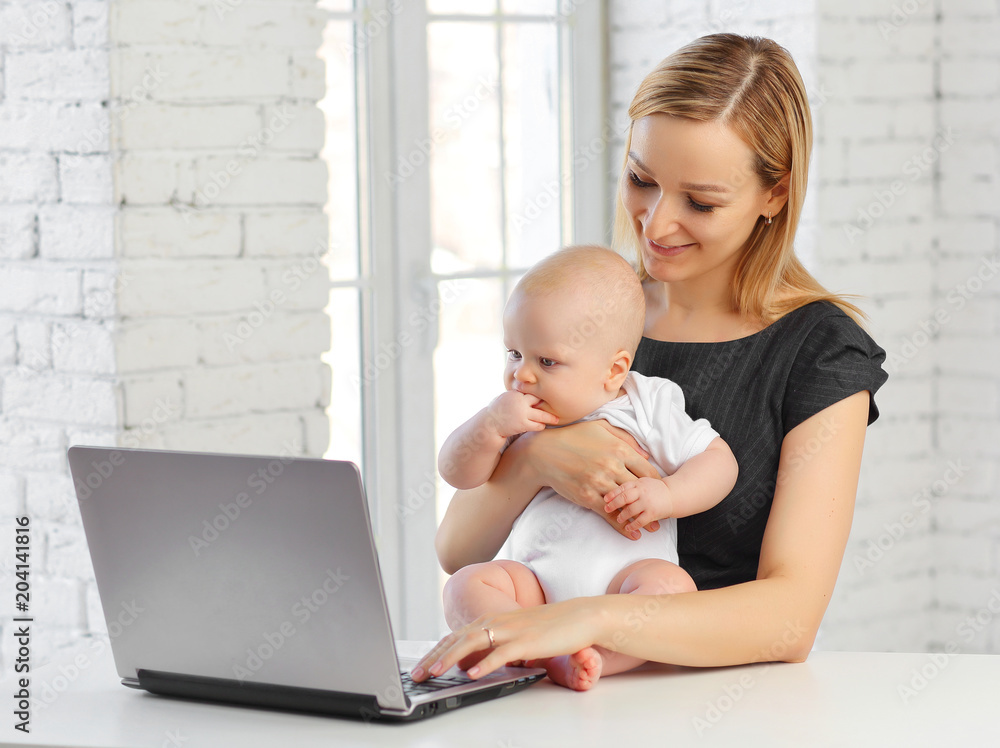 Portrait of a working mother and a newborn baby. Portrait of a working mother and a newborn baby.